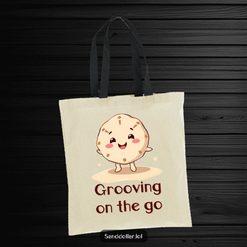 Funny tote bag with a happy sand dollar character, cheerful mouth, dancing on wet sand, perfect for carrying essentials with humor.